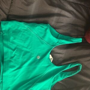 Bundle of 3 lululemon align tanks in Kelley green orange and pitch blue